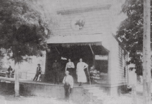 William T. Butler and his butcher shop